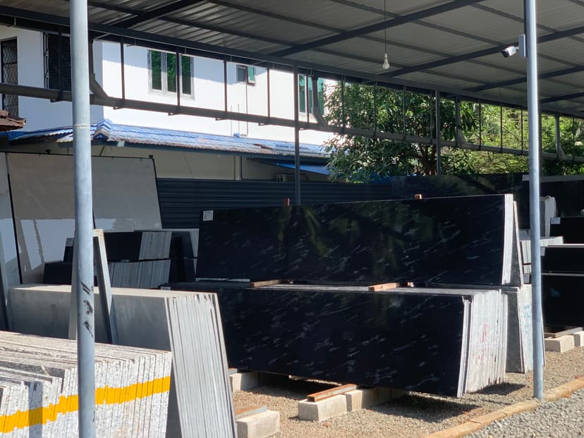 Best brown marble flooring in Kottakkal with golden patterns for a luxurious look